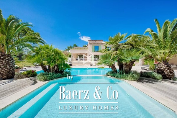 photo 4 In a closed and secured estate, properyt totally refurbished of about 600 sqm on an almost flat land of approximately 800 sqm decorated with a swimming pool and a tennis court.