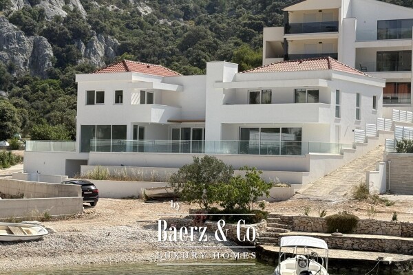 photo 1 Sevid - newly built luxury villa with pool, first row to the sea